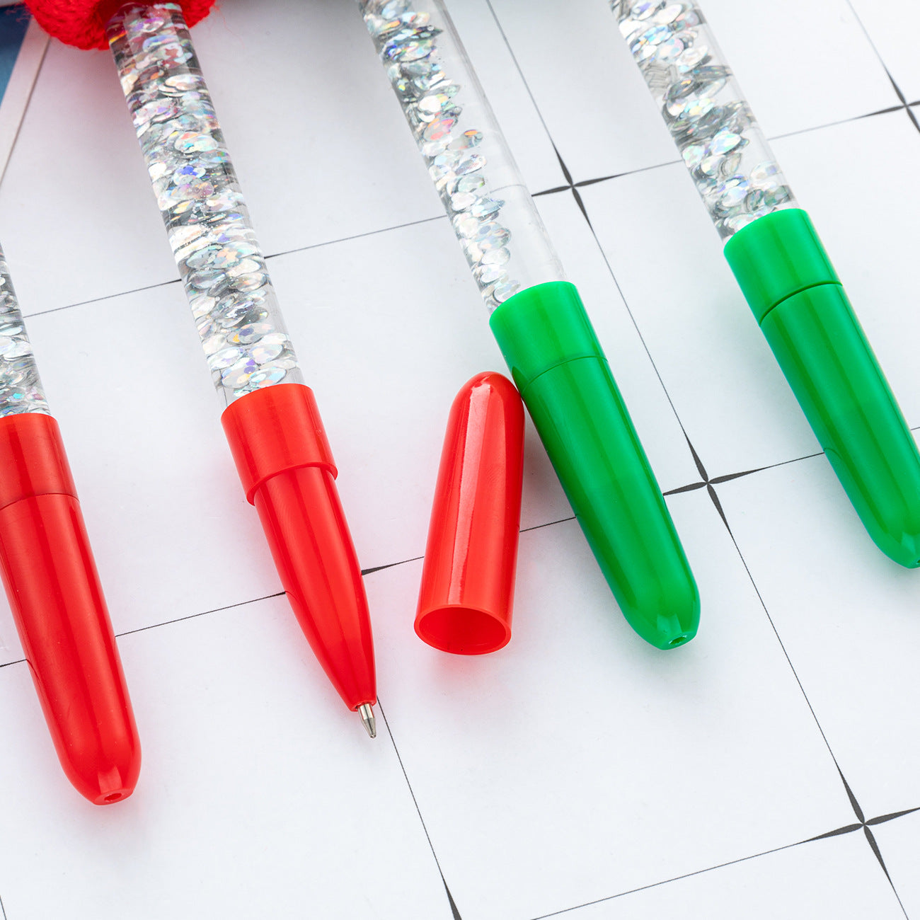 Wholesale Christmas ballpoint pen colorful quicksand oil-filled Christmas hat pen